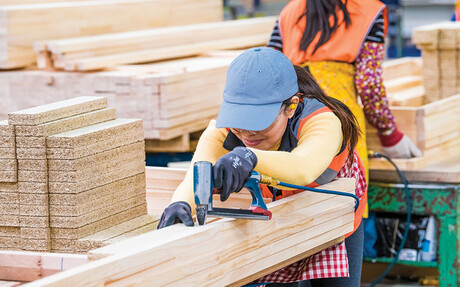 Compressed air is used here to power staple guns