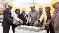 Group photo with Thomas and Tina-Maria Vlantoussi-Kaeser at the foundation stone ceremony for the new administration building