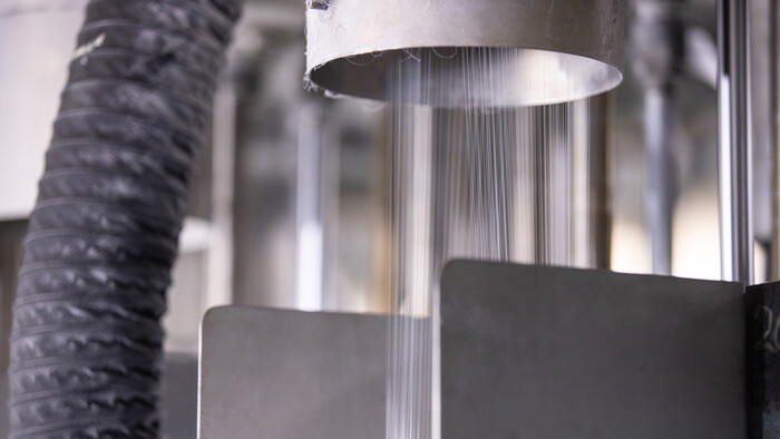 Compressed air is an essential utility required to operate many functions at Geofabrics - pictured here the filament spinning process