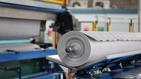 Compressed air is an essential utility required to operate many functions at Geofabrics - pictured here some end of production line machinery