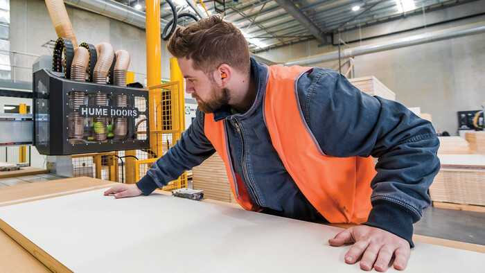Compressed air being used to power a CNC routing machine at Hume Doors.