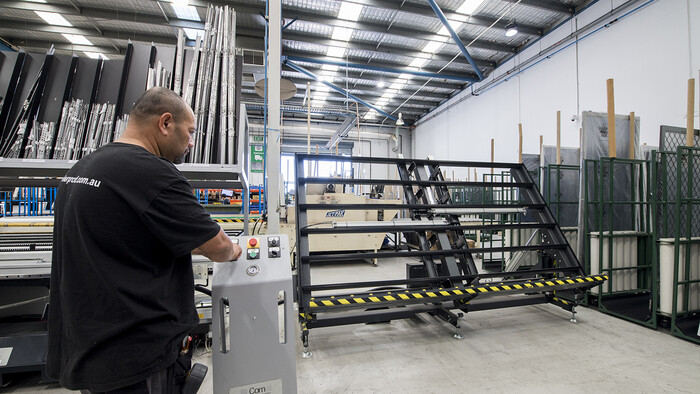 Kaeser compressed air system powering the hinge window frame and sash assembly table at Prowler Proof.