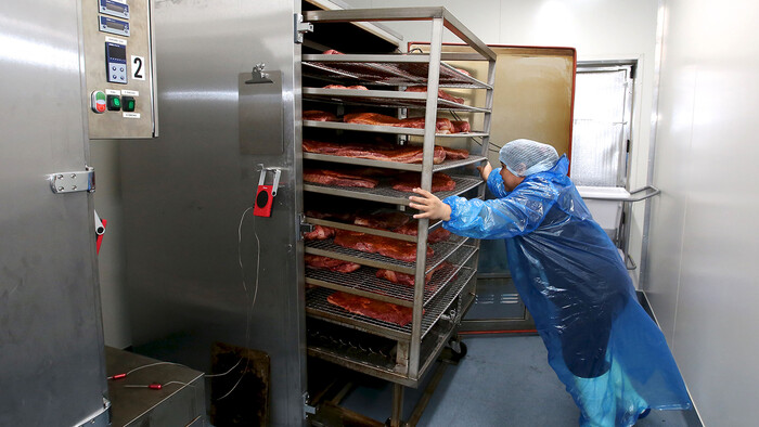 Smoking the meat at Texas BBQ Foods