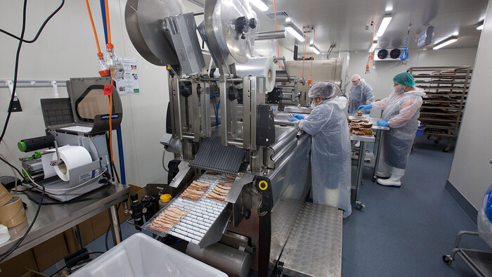 Processing the smoked meat at Texas BBQ Foods